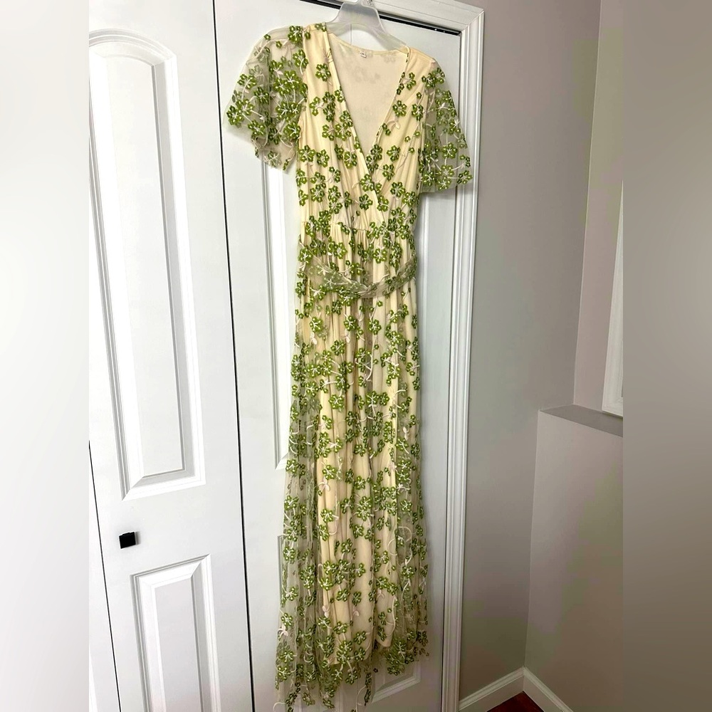 Baltic born maxi dress size small. cream color with a green floral overlay
